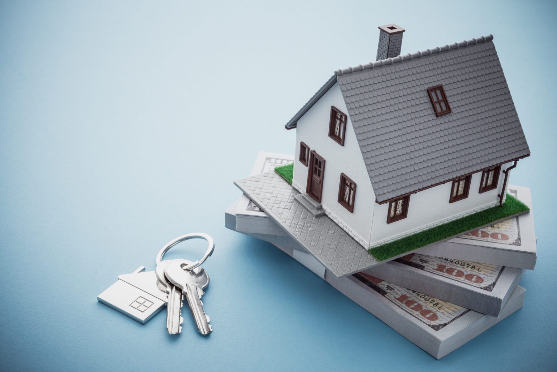 House over bills and house keys.